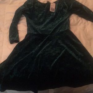 Emerald green velvet dress